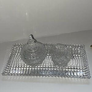 Brilliant vintage cut clear glass cream , and lidded sugar.